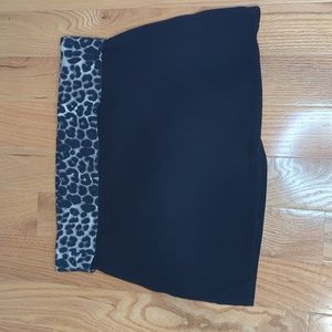 Express black mini shirt with leopard waist band